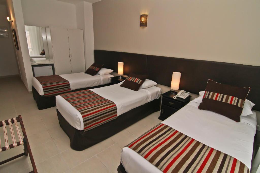 De La Plaza Hotel Μαλντονάντο Δωμάτιο φωτογραφία