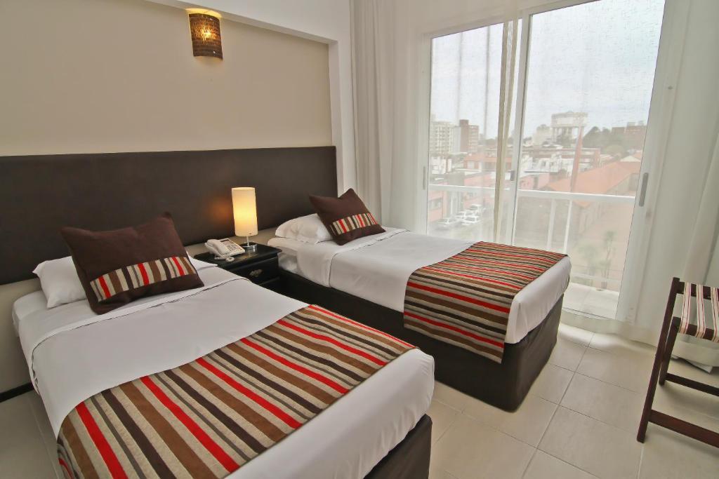 De La Plaza Hotel Μαλντονάντο Δωμάτιο φωτογραφία
